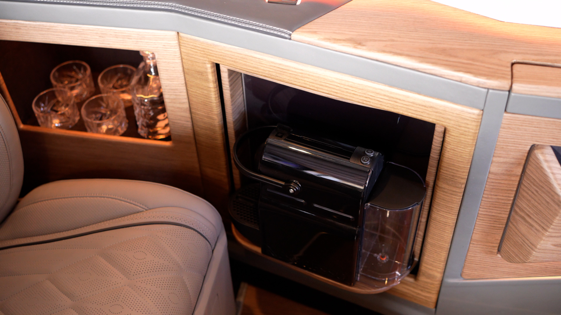 Integrated coffee machine and illuminated glass storage inside the Ilesbus Vito VIP
