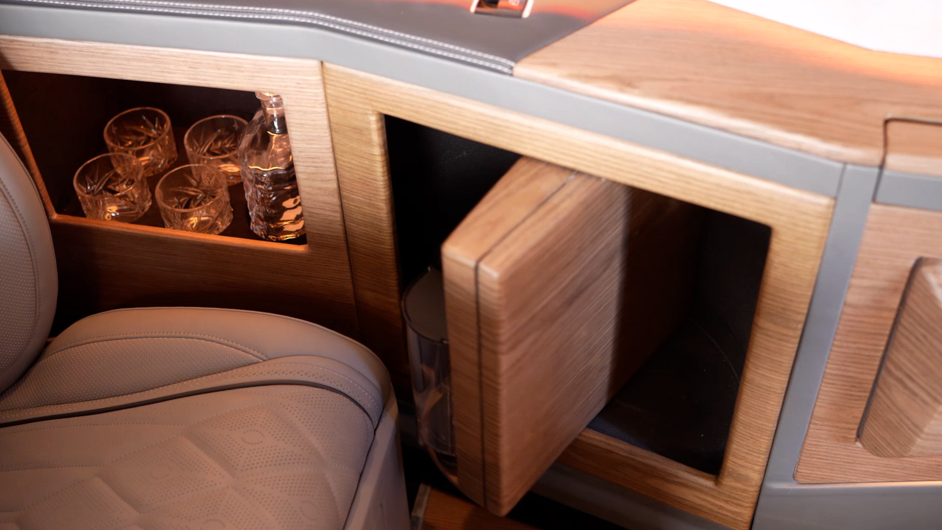 Open concealed drinks cabinet and storage compartment in the Ilesbus Vito VIP