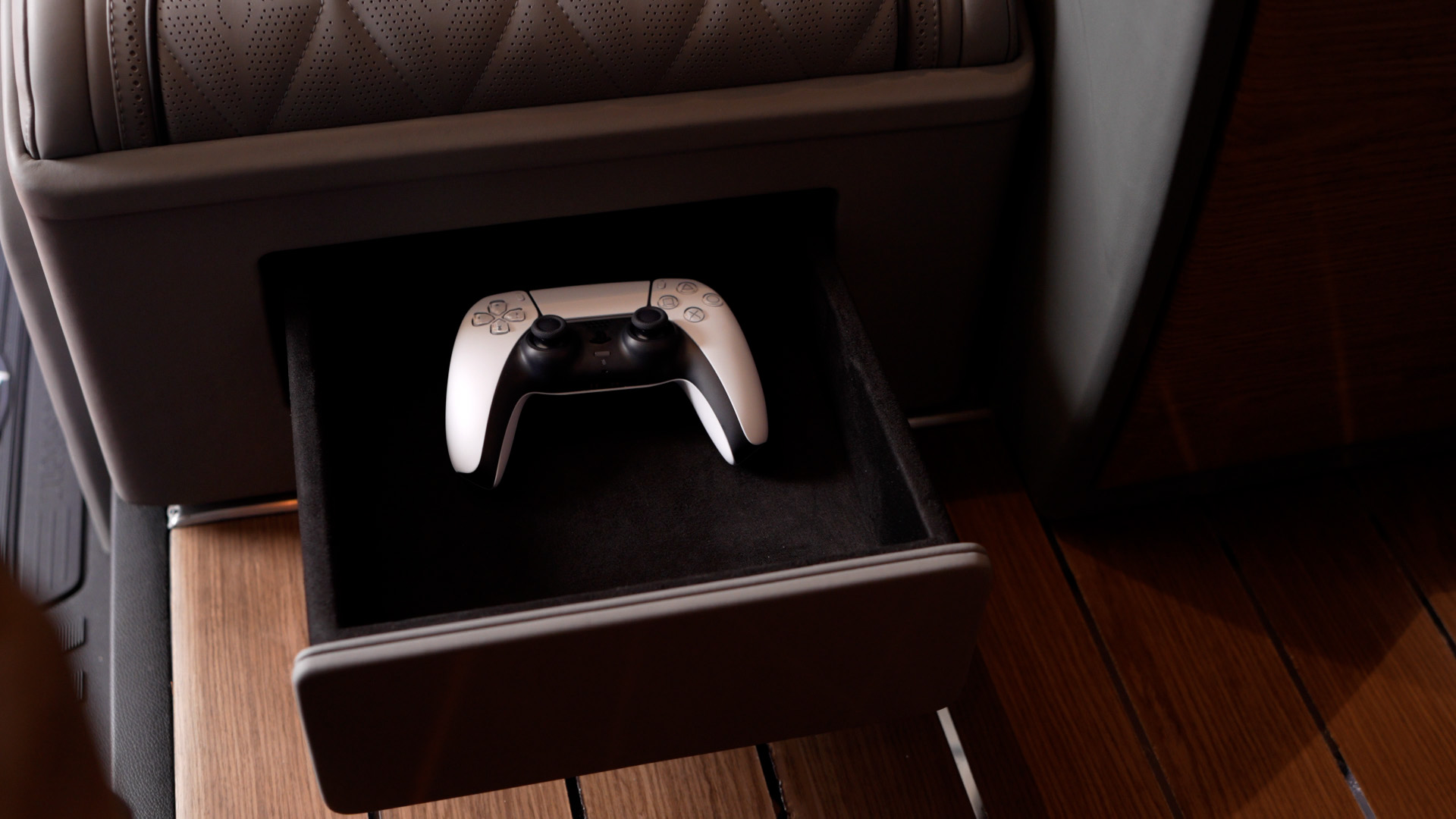 Concealed games console controller drawer inside the Ilesbus Vito VIP